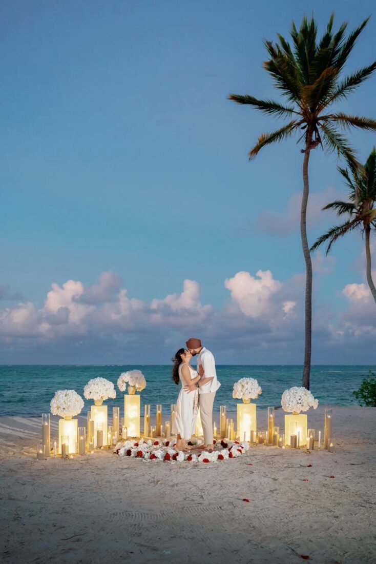 Elegant candlelight marriage proposal setup on Bounty Beach, Punta Cana